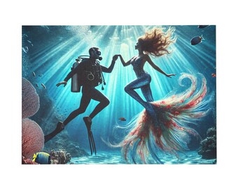 May include: An illustration shows a diver and a mermaid underwater, holding hands. The diver wears scuba gear, and the mermaid has a shimmering blue tail and flowing red hair. The background includes coral, fish, and sunlight filtering through the water.