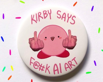Op de afbeelding: Een witte knop met een roze Kirby-personage dat de middelvinger opsteekt. De tekst op de knop luidt "Kirby Says F@#K AI ART".