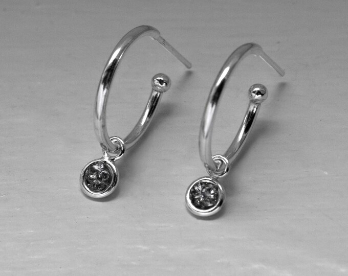 Silver hoop earrings with a circular crystal pendant – Delicate, shiny, and minimalist earrings.