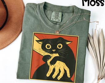 Comfort Colors® Ungovernable Cat Shirt, Funny Black Cat Biting Hand Tee, Viral Meme Graphic T-Shirt, Sarcastic Humor Gift For Her