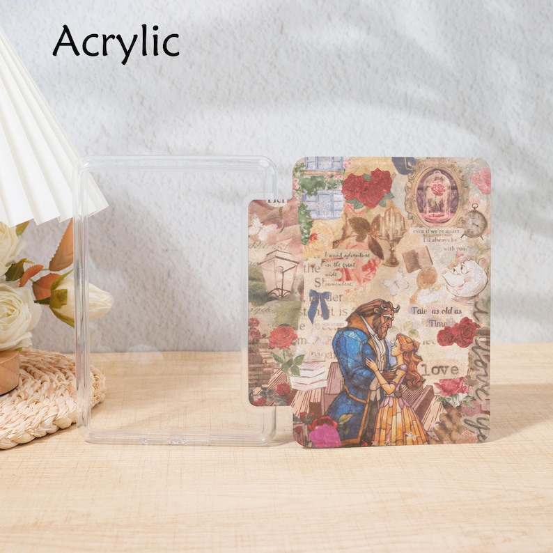 May include: Clear acrylic phone case with a printed insert featuring a collage of images, including a couple in formal attire, roses, and the text "love". The word "Acrylic" is printed at the top.