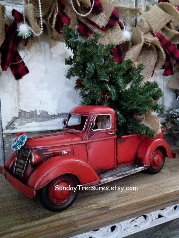 vintage metal red truck with christmas tree