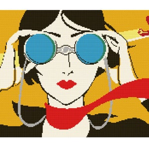 May include: A woman with short black hair wearing blue aviator sunglasses and a red scarf looks through the binoculars at a red airplane flying in the yellow sky.