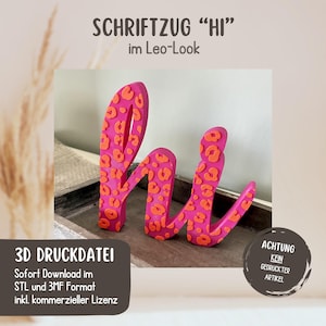 May include: A pink 3D printed "Hi" sign with orange leopard print accents. The sign is displayed on a wooden surface. Text on the image reads "3D print file" and "Attention, no printed article."
