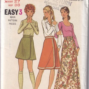 May include: Vintage Butterick sewing pattern for women's skirts and tops. The illustration shows three different outfits: a wrap skirt with a striped top, an orange wrap skirt with a white blouse, and a floral maxi skirt with a pink top. The pattern is labeled "Easy 3".