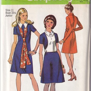 May include: A vintage sewing pattern for a dress, featuring three different styles. The pattern is for size 11, bust 33 1/2 inches, and is for juniors. The pattern is from Simplicity and is number 9024.