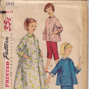 May include: Vintage Simplicity printed sewing pattern featuring three different outfits. The outfits include a long coat with a floral pattern, a striped top with red pants, and a blue jacket and shorts set. The pattern is size 14.