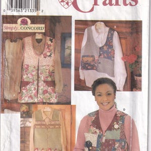May include: Simplicity Crafts pattern 8034 for a vest in sizes L and XL. The pattern envelope displays four variations of a sleeveless vest featuring patchwork designs with floral prints and gingham patterns, shown worn over various shirts and sweaters.