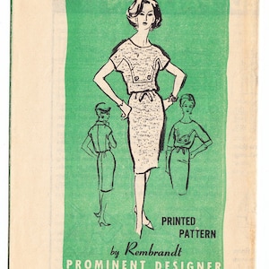 Può includere: Un cartamodello vintage per un abito con gonna aderente e top a maniche corte. Il cartamodello è stampato su carta verde e presenta un'illustrazione in bianco e nero di una donna che indossa l'abito. Il cartamodello è di Rembrandt, un designer di spicco, ed è taglia 16. Il numero del cartamodello è A963.