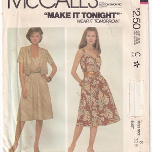 May include: A sewing pattern for a dress and jacket. The pattern is from McCall's and is called "Make It Tonight". The pattern is for a miss size 8 with a bust size of 31 1/2 inches.