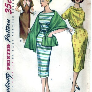 May include: Vintage Simplicity sewing pattern for a dress, size 12, bust 30. The pattern shows three different styles of dresses: a striped dress with a green shawl, a brown dress with a white collar, and a yellow dress with a floral pattern. The pattern is printed on a white background with red and black text.