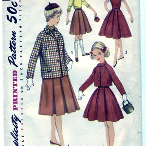 May include: A vintage sewing pattern for a girl's dress and jacket. The pattern includes three different styles, all with a pleated skirt. The pattern is printed on a white background with black text and illustrations. The text on the pattern reads "Simplicity PRINTED Pattern 50c DETAILS PRINTED ON EACH PATTERN PIECE Size 7".