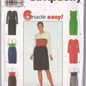 May include: A sewing pattern for a dress with six different variations. The pattern is for sizes 6, 8, and 10. The pattern is called "Simplicity" and is "made easy!" The pattern includes a black dress with a white collar and red trim, a black dress with a green trim, a black dress with a white collar and red trim, a green dress, a red dress, and a black and white checkered dress.