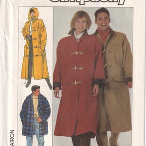 May include: Simplicity sewing pattern 8312 size XS featuring illustrations of long coats with toggle closures. The pattern shows a yellow hooded coat, a blue plaid jacket, a long red coat with a dark collar, and a long tan coat with a dark collar.