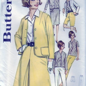 May include: A vintage sewing pattern for a yellow jacket and skirt set. The pattern is from Butterick and is size 10, bust 31. The pattern number is 2710 and the price is 75 cents.