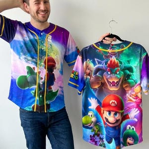 May include: A set of three ceramic mugs with a speckled, matte finish. The mugs are in shades of cream, light gray, and dark gray. Each mug has a simple, minimalist design, perfect for coffee or tea.