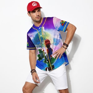 May include: A white ceramic mug with a black handle and the text "But First, Coffee" in a bold, black font. The mug is set against a blurred background, suggesting a cozy setting.