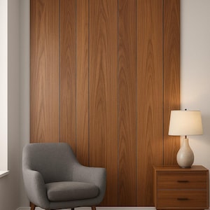 May include: A modern interior scene featuring a gray armchair, a wooden nightstand with a lamp, and a large wooden panel wall. The wall is made of vertical wooden planks with visible grain. The room has a minimalist design.