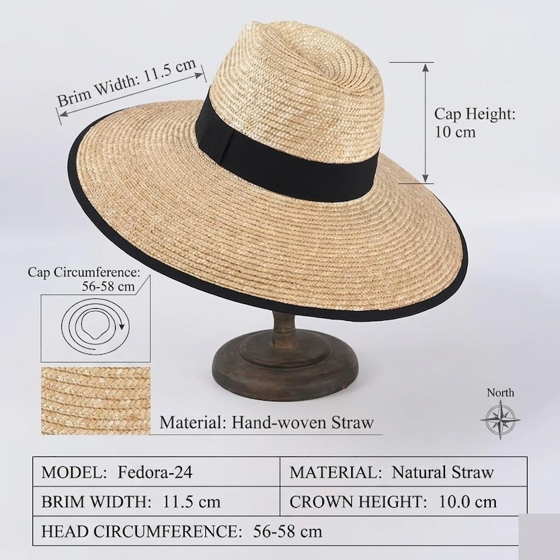 May include: A natural straw Fedora hat with a black band and brim trim. The brim width is 11.5 cm, and the crown height is 10 cm. The head circumference is 56-58 cm. The hat is hand-woven and displayed on a wooden stand.