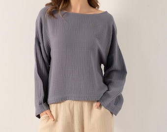 Blusa de muselina: Túnica de manga larga con cuello barco