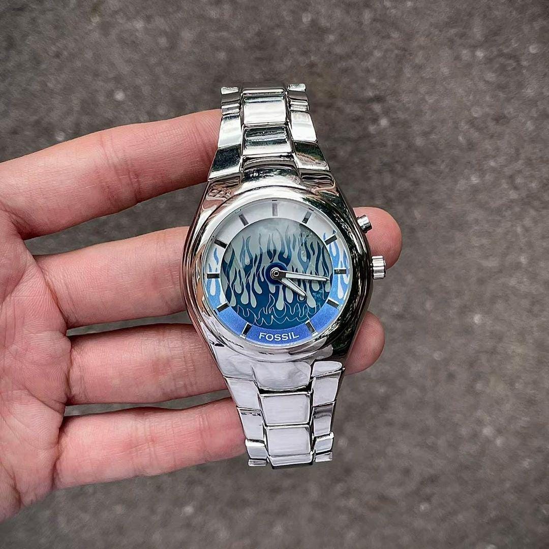 時計 fossil big tic RELIC fire animation Flame Animation Dial Fossil Big Tic Watch Flame Digital