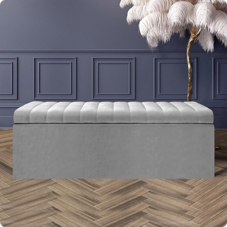 Silver velvet upholstered storage ottoman box with soft-opening lid and deep compartment – elegant handmade storage bench for bedroom or living room.