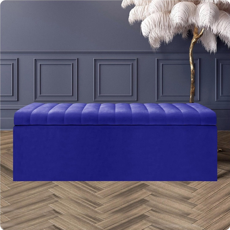 Sapphire blue velvet upholstered storage ottoman with deep storage and soft-close lid – handmade luxury velvet storage bench made to order in the UK.