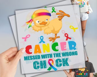 May include: A colorful graphic design featuring a cartoon chicken with a rainbow headband kicking up its leg. The text reads "Cancer messed with the wrong chick" with a rainbow ribbon.