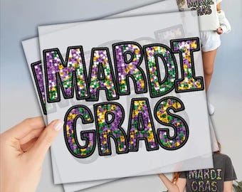 May include: A white t-shirt with a purple, green, and gold glitter-effect design that says "Mardi Gras".