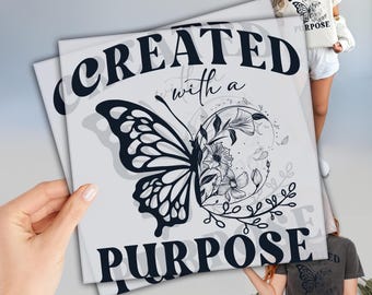 May include: A white background with black text that reads "Created with a Purpose" and a black and white butterfly with floral accents.