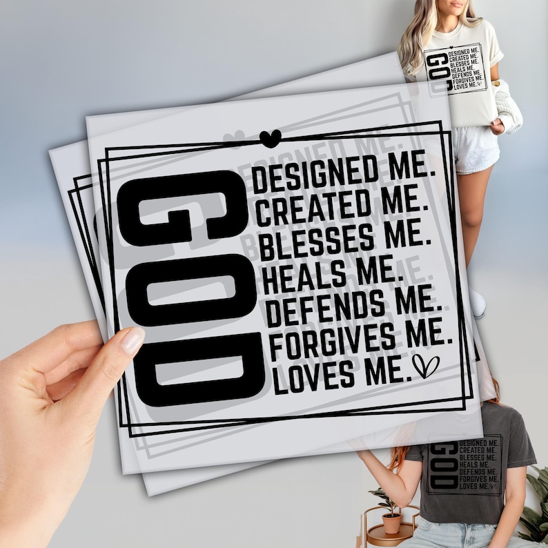 a person holding a piece of paper with the words god on it