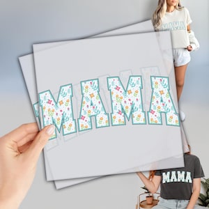 a person holding up a picture of a woman