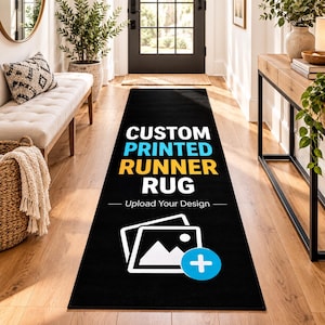 May include: A long black rectangular runner rug featuring the white text CUSTOM, the blue text PRINTED, the yellow text RUNNER, and the white text RUG. Below this, it says Upload Your Design with a white icon of two stacked photos and a blue plus sign.