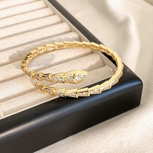 Gold snake bangle with Cz crystal