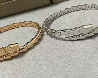 Gold Snake Bangle: Statement Wrist Jewelry