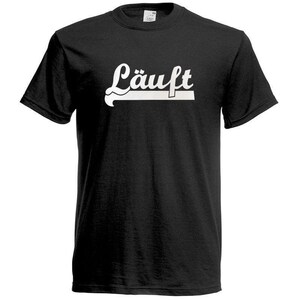 Puede incluir: Camiseta negra de cuello redondo con la palabra "Lauft" en escritura blanca en el pecho. La palabra está encima de una barra horizontal blanca. La camiseta está hecha de un material suave.
