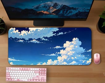 May include: A rectangular mousepad with a blue sky and cloud design, a pink mouse, and a pink keyboard sit on a wooden desk. Two potted plants and a computer monitor are also visible.