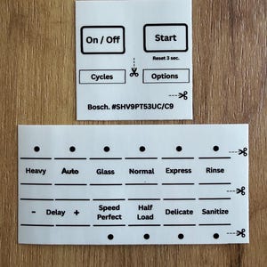 May include: A set of white adhesive labels with black text for a Bosch dishwasher control panel, model #SHV9PT53UC/C9. The labels feature buttons for On/Off, Start, Cycles, Options, Heavy, Auto, Glass, Normal, Express, Rinse, Delay, Speed Perfect, Half Load, Delicate, and Sanitize.