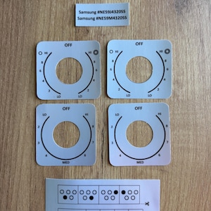 May include: A set of white square stove control knob overlays with black printed markings, including temperature settings from LO to HI and OFF. Two labels display Samsung #NE59J4320SS and #NE59M4320SS, and a guide shows burner indicator diagrams.