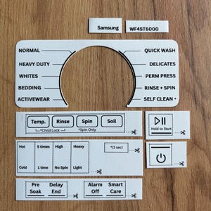 Può includere: Adesivi bianchi di ricambio per il pannello di controllo di una lavatrice Samsung WF45T6000. Gli adesivi includono impostazioni per Normal, Heavy Duty, Whites, Bedding, Activewear e altro. Include anche i pulsanti di avvio e di accensione.