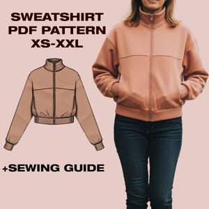 Peut inclure: Un sweat-shirt pêche à fermeture éclair et col montant, porté avec un jean bleu foncé. L'image présente également un dessin au trait du sweat-shirt et le texte "SWEATSHIRT PDF PATTERN XS-XXL + SEWING GUIDE."