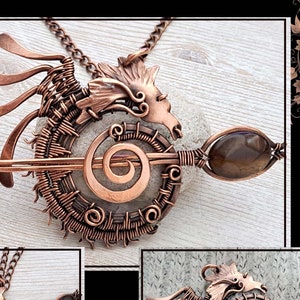 May include: A copper wire dragon pendant, pin, and brooch with a brown gemstone. The piece is handmade and says "Three in one Dragon Pin, brooch, pendant DIY by GemSeeker Studio".