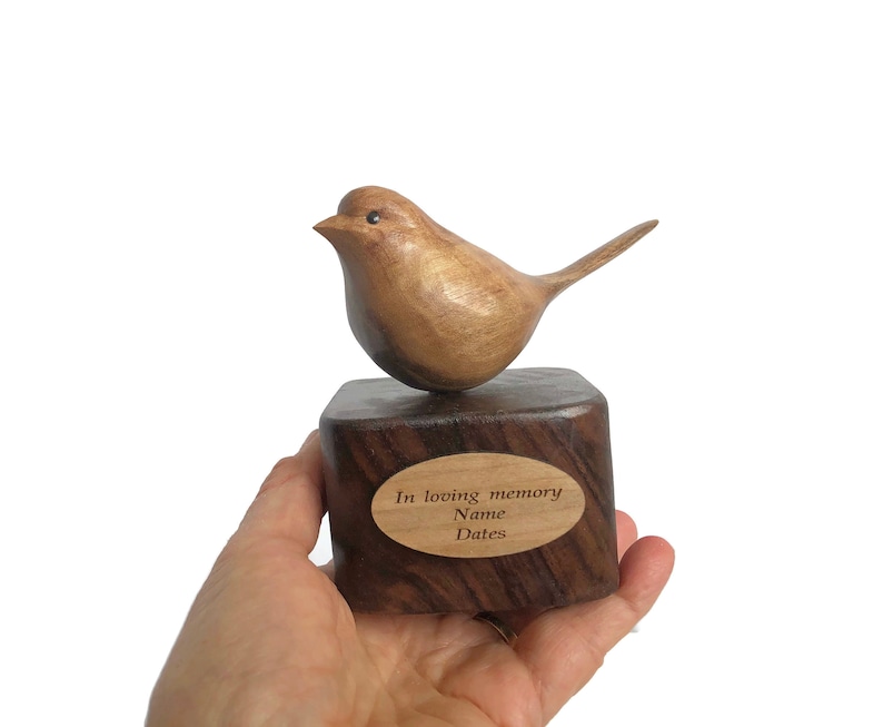 In loving memory bird wood carving