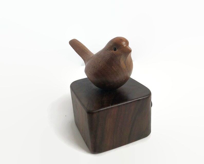 In loving memory bird wood carving