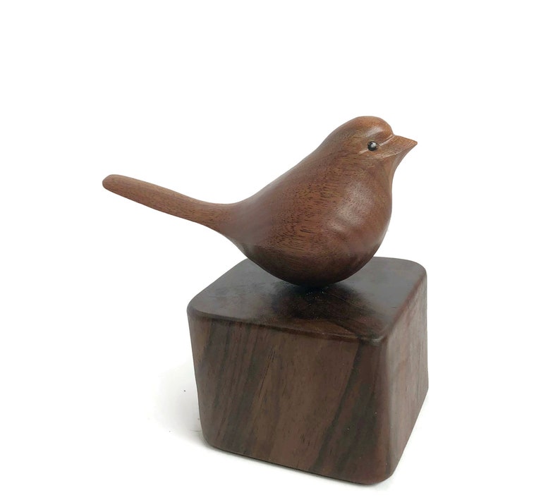 In loving memory bird wood carving