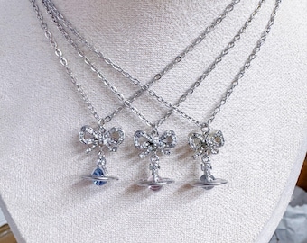 Salturn Bow Necklace: Silver Chain Orb Planet Pendant