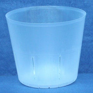 May include: A translucent, cylindrical plastic plant pot with a slightly flared top. The pot has vertical slits for drainage and is designed for planting. The pot is made of a frosted, semi-transparent material.