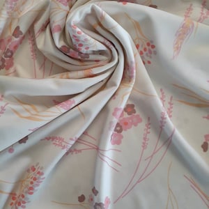 Vintage Polyester Knit floral fabric. Measures 60 wide and 1 9/10 of a yard. Perfect retro Polyester!