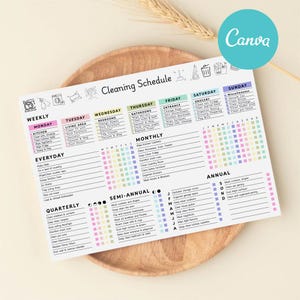 May include: A white cleaning schedule planner with a colorful layout, featuring sections for weekly, monthly, and annual tasks. The planner includes text and icons for various cleaning activities, with the Canva logo in the upper right corner.