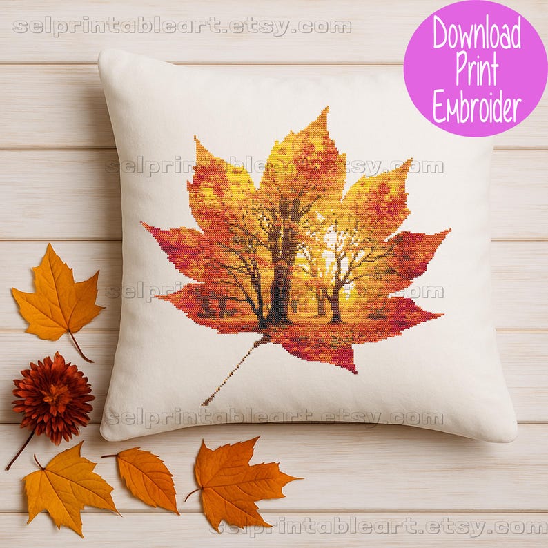 Romantic autumn forest landscape cross stitch inside a maple leaf design - Golden fall leaf embroidery pattern featuring a glowing woodland scene - Nature-inspired autumn decor – maple leaf cross stitch with forest sunlight - Rustic woodland fall embroidery, perfect for cozy seasonal wall art - Detailed maple leaf cross stitch pattern with a warm, romantic autumn theme